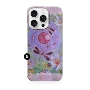 May include: A clear phone case featuring a painted design with a dragonfly, flowers, and a central purple orb. The artwork has a watercolor style with shades of purple, pink, and green. The number 5 is printed in black on the bottom left.
