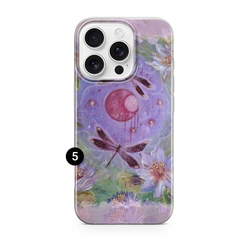 May include: A clear phone case featuring a painted design with a dragonfly, flowers, and a central purple orb. The artwork has a watercolor style with shades of purple, pink, and green. The number 5 is printed in black on the bottom left.