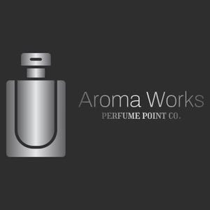 May include: A silver perfume bottle illustration with a rectangular body and a rounded U-shaped design, set against a dark gray background. The text "Aroma Works" and "PERFUME POINT CO." are displayed in a silver font.
