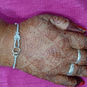 Platinum bracelet; sterling silver with white Zircon bracelet; Modern openable bracelet