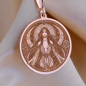 Lilith necklace in gold featuring detailed sacred feminine symbol pendant on chain occult jewelry