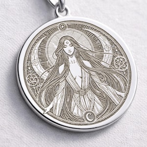 Lilith necklace in gold featuring detailed sacred feminine symbol pendant on chain occult jewelry