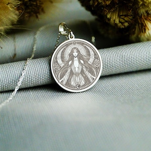 Lilith necklace in gold featuring detailed sacred feminine symbol pendant on chain occult jewelry
