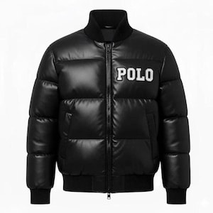May include: Black puffer jacket with a zip closure, featuring the white word "POLO" on the chest. The jacket has a ribbed collar, cuffs, and hem. A stylish outerwear piece.