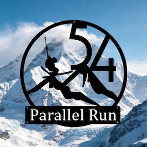 May include: Black metal wall art featuring a skier in silhouette, the numbers "54" within a circle, and the words "Parallel Run" below. The background shows a snow-covered mountain range under a blue sky.