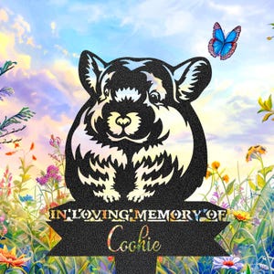 May include: Black metal garden stake with a chinchilla silhouette and the text "IN LOVING MEMORY OF Cookie". A blue butterfly and colourful flowers are in the background. The stake is designed for outdoor use.