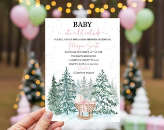 May include: A baby shower invitation with the text "BABY" and "it's cold outside." The invitation features a watercolor illustration of pine trees and a baby cradle. The event is for Morgan Smith on November 16th.