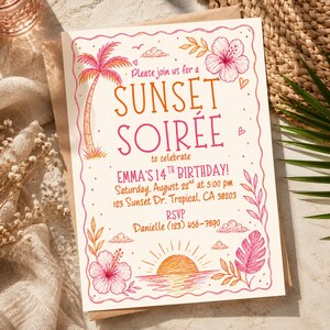 May include: A rectangular invitation card with a cream background featuring pink and orange hand-drawn illustrations of a palm tree, hibiscus flowers, and a sunset. The text reads: Please join us for a SUNSET SOIRÉE to celebrate EMMA'S 14TH BIRTHDAY!
