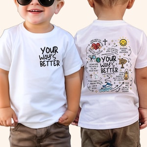 May include: White t-shirts with the text "YOUR WAY'S BETTER" on the front and a graphic design on the back. The design includes text and illustrations such as a heart, cross, and a smiling sun.