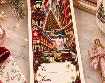 May include: A rectangular gift tag featuring a festive New York City holiday scene with Radio City Music Hall, a Macy's storefront, a yellow taxi, and a large Christmas tree. The bottom section includes the printed text To: and From:.