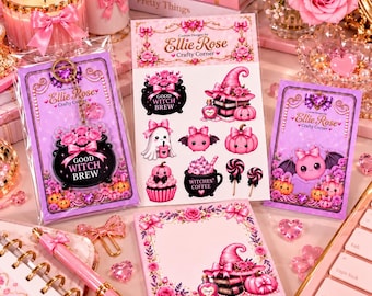 May include: A collection of pink and purple stationery items featuring Ellie Rose Crafty Corner branding, including a keychain, a sticker sheet, a notepad, and a pen, all decorated with illustrations of pumpkins, ghosts, and witch-themed motifs.