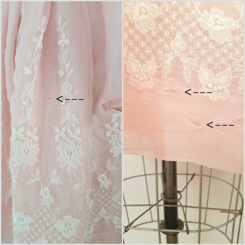 May include: A pink sheer dress with white embroidered floral details. The dress has some small tears in the fabric.