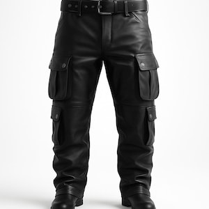 May include: Black leather cargo pants featuring a matching belt with a silver-toned buckle, two large flap pockets on each thigh, and two additional flap pockets on the lower legs. The pants have a straight-leg cut and are paired with black boots.