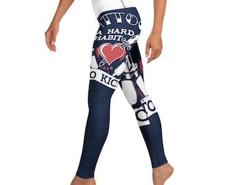 May include: Navy blue and white leggings with a high waistband. The leggings feature a tattoo-inspired design with a red heart, a dagger, and the text "Tattoo, A Hard Habit, To Kick". The leggings are form-fitting.