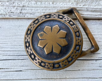 vintage 1970s snowflake belt buckle small flake brass heavy early Tech Ether