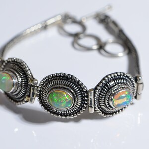 Three Stone Ethiopian Welo Opal Bezel Setting in Rhodium over Sterling Silver  Byzantine Chain Toggle Clasp Bracelet Birthstone October