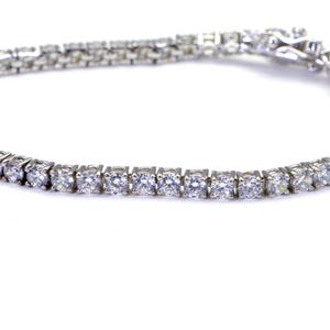 Simulated Diamond Tennis Bracelet: 14K Gold Over Sterling Silver, 7 inch
