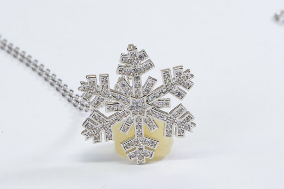 Snowflake Necklace 8-point with 9 CZ Rhodium on Sterling Silver - Includes Chain Snowflake Necklace 8-point with 9 CZ Rhodium on Sterling Silver - Includes Chain
