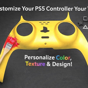 May include: A yellow PS5 controller shell with paint cans and a paintbrush. The text reads "Customize Your PS5 Controller Your Way!" and "Personalize Color, Texture & Design!" Black, pink, and white controller buttons are also visible.