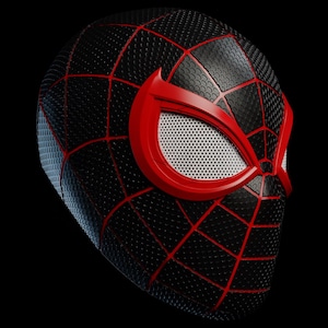 May include: Black and red Spider-Man mask with a textured surface and red web lines. The eye openings are white with a mesh pattern, and the mask has a red frame around the eyes. The mask is a superhero costume accessory.