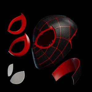 May include: A black and red Spider-Man mask with separate red eye pieces and a lower jaw component. The mask features a textured surface with a web pattern in red. The eye pieces are red and the eye lenses are white with small holes.