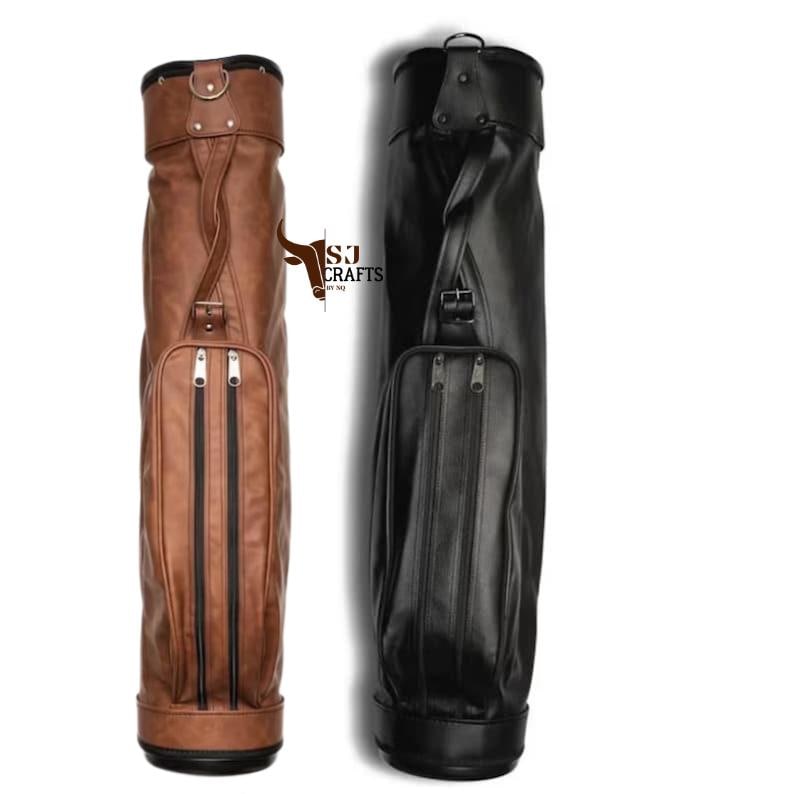 May include: Two leather golf club bags, one in brown and the other in black, stand side by side. Each bag has a cylindrical shape with a top handle, a side handle, and a zippered pocket. The brown bag has a lighter color than the black bag.
