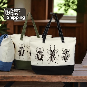 May include: Beige tote bags with black beetle illustrations. The bags have black or green handles and a black or green base. The text "Next Day Shipping" is in the upper left corner.