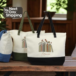 May include: Cream-colored tote bags with black and green accents. The bags feature a floral and book design with the name "Maria" printed below. The words "Next Day Shipping" are in the upper left corner.