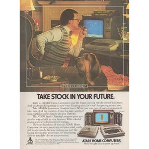 May include: Vintage advertisement for Atari Home Computers. The image shows a man in a sweater vest using a computer, with a dog nearby. The ad text reads "Take Stock in Your Future."