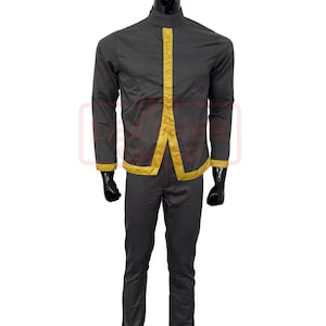 May include: A dark grey suit comprising a mandarin collar shirt and trousers. The shirt has a vertical gold trim down the front and around the cuffs and hem. The suit is displayed on a mannequin.