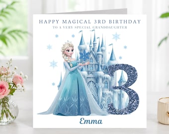 May include: A square birthday greeting card featuring a blue ice castle and a blonde character in a light blue gown. The text reads HAPPY MAGICAL 3RD BIRTHDAY TO A VERY SPECIAL GRANDDAUGHTER and Emma. A large, textured, dark blue glittery number 3 is included.