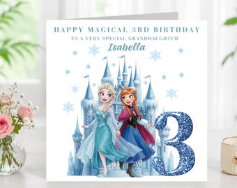 May include: A square greeting card featuring a blue ice castle, snowflakes, and two cartoon characters. The text reads: Happy Magical 3rd Birthday to a very special granddaughter Isabella. A large, glittery blue number 3 is on the right side.