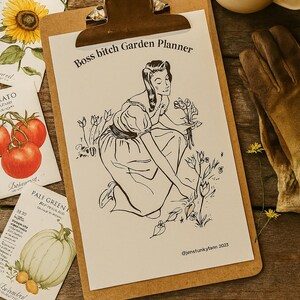 May include: A clipboard with a "Boss bitch Garden Planner" print featuring a woman gardening, surrounded by seed packets and a coffee mug. The image has a vintage aesthetic, with a wooden background and gardening gloves.