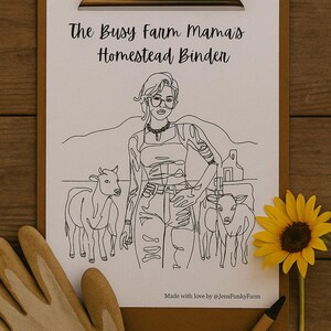 May include: A clipboard with a drawing of a woman with calves and the text "The Busy Farm Mama's Homestead Binder." A yellow sunflower, a pen, and a work glove are also present.
