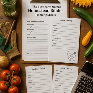 May include: A clipboard with planning sheets titled "The Busy Farm Mama's Homestead Binder" sits on a wooden surface, surrounded by fresh produce, gardening gloves, and a laptop. The image includes tomatoes, zucchini, and a sunflower.