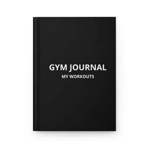May include: Black journal with the text "GYM JOURNAL" and "MY WORKOUTS" in white. The journal is closed and has a clean, minimalist design, suitable for fitness tracking and workout logging.