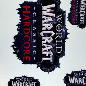 May include: Multiple stickers featuring the "World of Warcraft Classic Hardcore" logo. The main logo is a dark gray emblem with the game title in white and red text. The design includes spiky edges and a dark blue background.