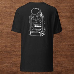 May include: Black t-shirt featuring a white line drawing of a stage light. The graphic shows the light's housing, lens, and base. The shirt is made of a soft material and has a classic crew neck.
