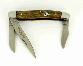 Rough Rider Stockman Knife with hand cut sterling silver sailboat inlay