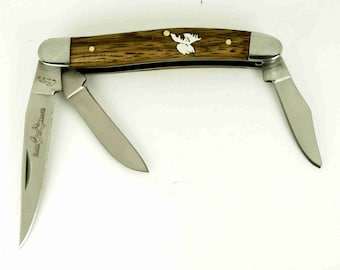 Rough Rider Stockman Knife with hand cut sterling silver moose inlay