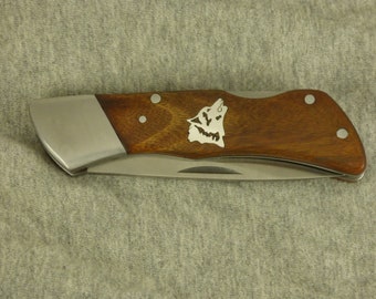 Kershaw pocket knife with Hand cut sterling silver wolf head inlay