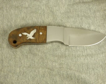 Elk Ridge hunting knife with hand cut sterling silver flying eagle inlay
