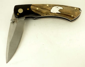 Rough Rider knife with Zebra wood handle and Custom sterling silver eagle head inlay