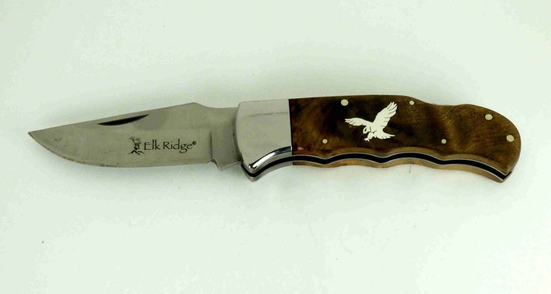 Elk Ridge Lockback knife with Custom sterling silver flying eagle inlay image 1