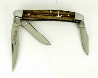 Rough Rider Stockman Knife with hand cut sterling silver anchor inlay