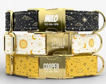 May include: Three personalized dog collars with gold-colored hardware. The top collar is black with a celestial pattern, the middle is white with a sun and moon design, and the bottom is yellow with a similar celestial pattern. Each collar has a gold buckle with a name and phone number.