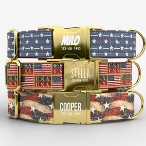 May include: Three dog collars with patriotic American flag designs. Each collar features a gold-colored buckle with a pet's name and phone number. The collars display patterns of stars and stripes in red, white, and blue.