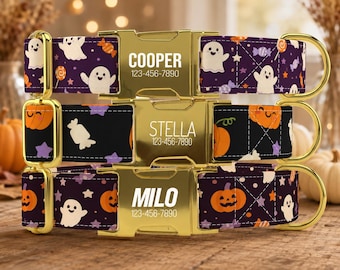 May include: Three pet collars with gold-tone metal buckles, each engraved with a name and phone number. The fabric features Halloween patterns including ghosts, pumpkins, stars, and candy on dark purple and black backgrounds with gold hardware.