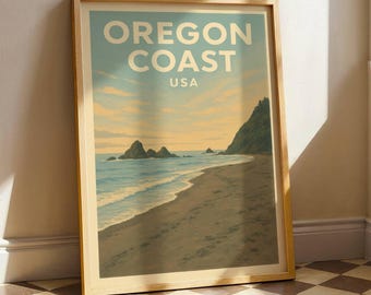May include: A framed print featuring a coastal landscape with the text "OREGON COAST USA". The artwork depicts a beach with ocean waves, rocky formations, and a green cliff under a sky with clouds. The frame is made of light-colored wood.