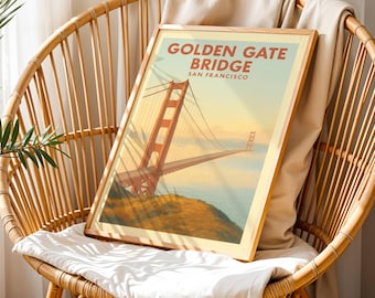 May include: A framed print featuring the Golden Gate Bridge in San Francisco. The artwork depicts the iconic bridge in shades of orange and red against a backdrop of blue water and a golden sky. The text "GOLDEN GATE BRIDGE SAN FRANCISCO" is at the top.